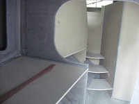 Forward port cabin with access steps to saloon