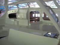 View of cockpit into the saloon from the top of the starboard transom steps.