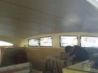 Headliner panels and forward saloon windows fitted.