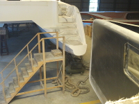 Carbon infused bow and e-glass transom.